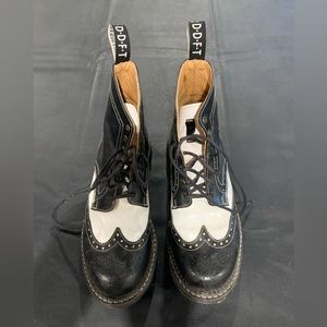 Men’s Fluevog boots worn a handful of times and set aside.